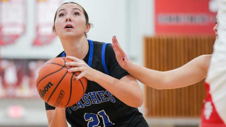 See photos of New Palestine take on Franklin Central in girls basketball action