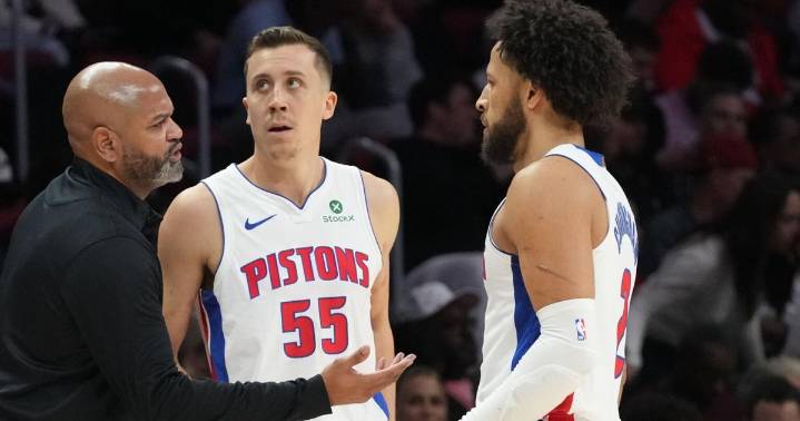 Pistons hold off Heat