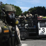 Trump administration sues California over law banning masked federal agents