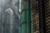 Hong Kong officials warned over a year before deadly inferno