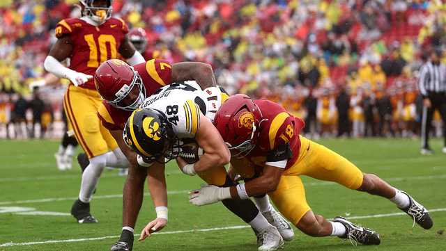 USC rallies with big second half against Iowa to keep playoff hopes alive
