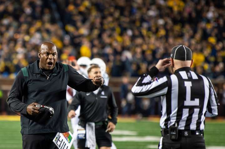 Michigan State football hit with NCAA recruiting violations, must vacate wins