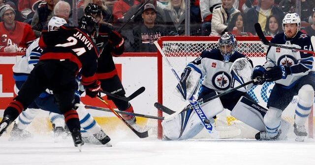 Jarvis scores a hat trick as Hurricanes pull away in third period to beat Jets 5