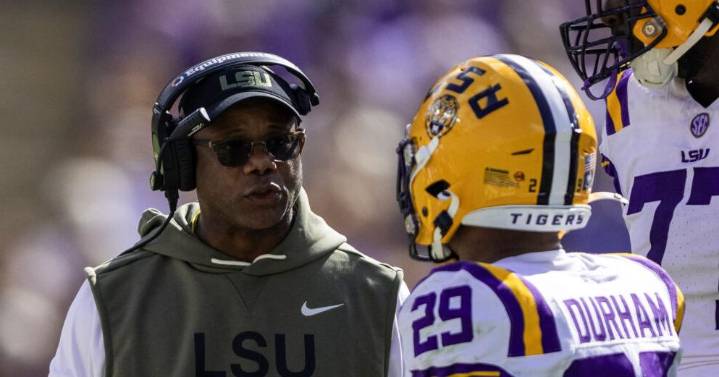 Interim coach Frank Wilson had an emotional moment after leading LSU to a win over Arkansas