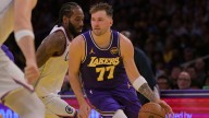 Lakers’ Luka Doncic reacts to Jaxson Hayes having his back against Kris Dunn