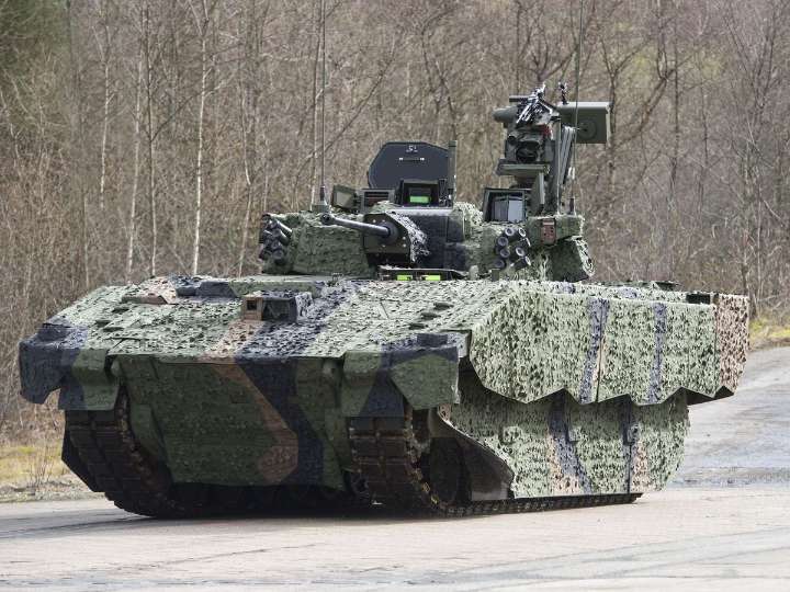 Army pauses use of Ajax fighting vehicles for two weeks after soldiers fall ill