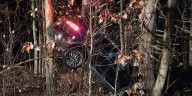 Woman hospitalized after crash on blind curve in Plainfield