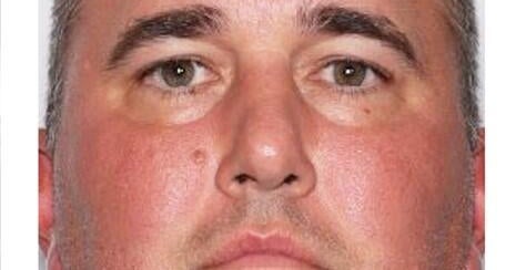 Missing Virginia high school football coach is wanted on child porn charges, police say