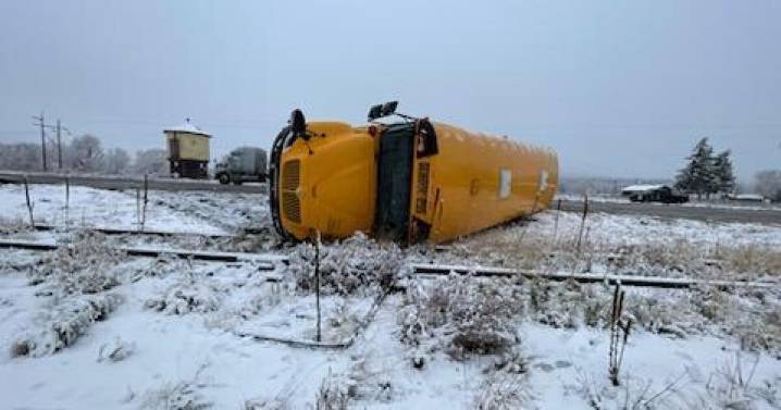 School bus with 13 children on board overturns in icy conditions near South Fork on Thursday, no injuries
