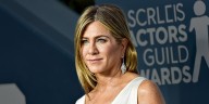 Jennifer Aniston Walks the Red Carpet With Boyfriend Jim Curtis for the First Time