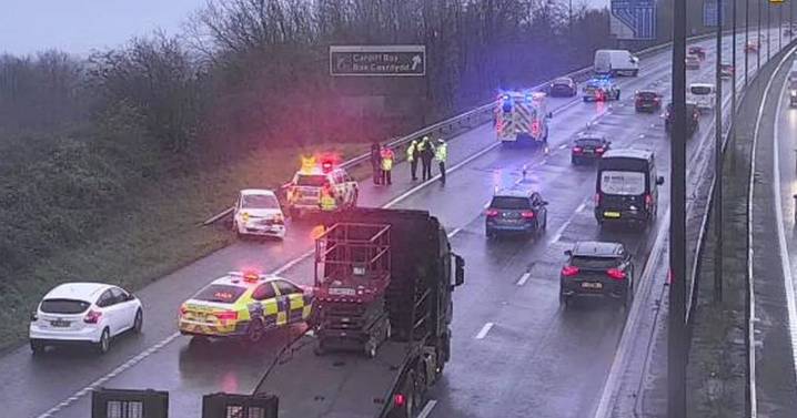 M4 closed after two crashes as four-vehicles collide and one person cut from a car