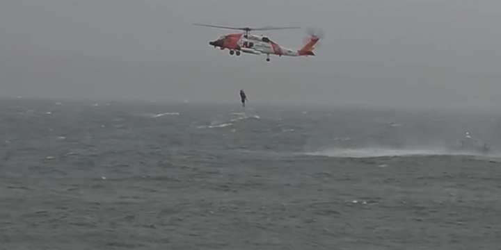 A father and son rescued by the Coast Guard