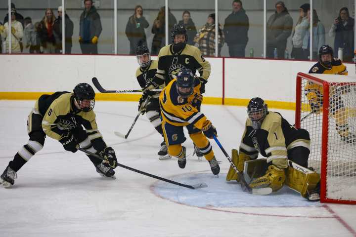 Prep hockey roundup: Spartans put up eight; Moorhead blitzes Roseau