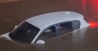 Three horrifying Storm Claudia flood videos with bins floating and cars underwater