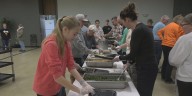 Volunteers prepare and deliver Thanksgiving meals to senior citizens