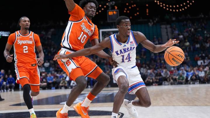 Double-doubles by Tre White and Flory Bidunga help Kansas beat Syracuse 71