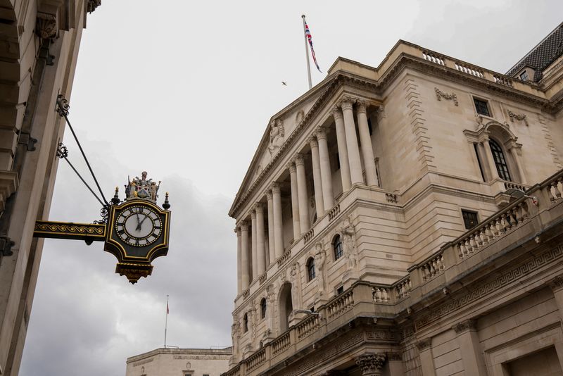 Bank of England sees wider QE benefits cushioning big losses