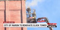 Crews renovating the clock tower in Marion, Illinois