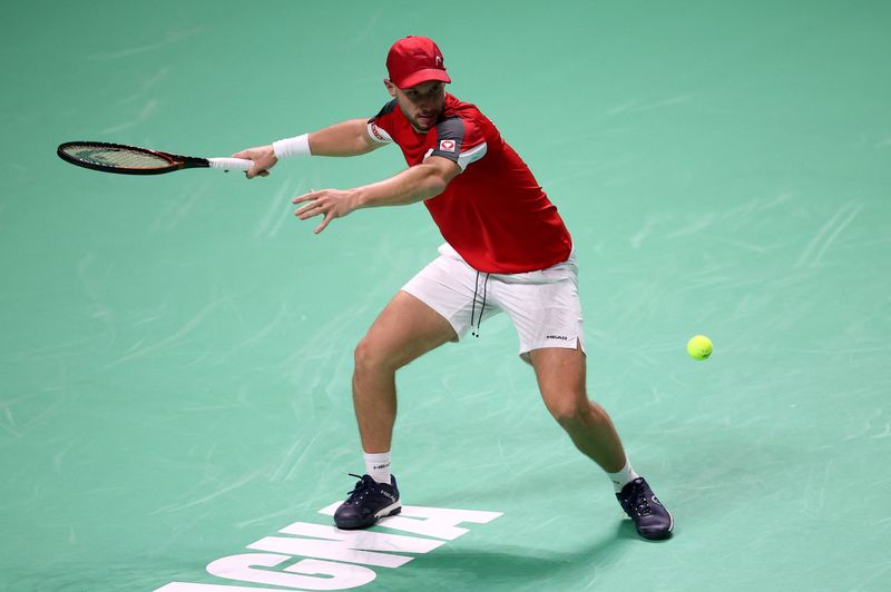 Tennis-Holders Italy ease past Austria to reach Davis Cup semi
