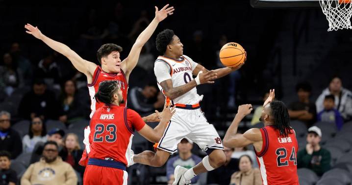 No. 21 Auburn comes from behind with 2nd-half surge to knock off No. 14 St. John's, 85