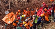 Indonesian rescuers search for nearly three dozen people after landslides killed at least 18 people