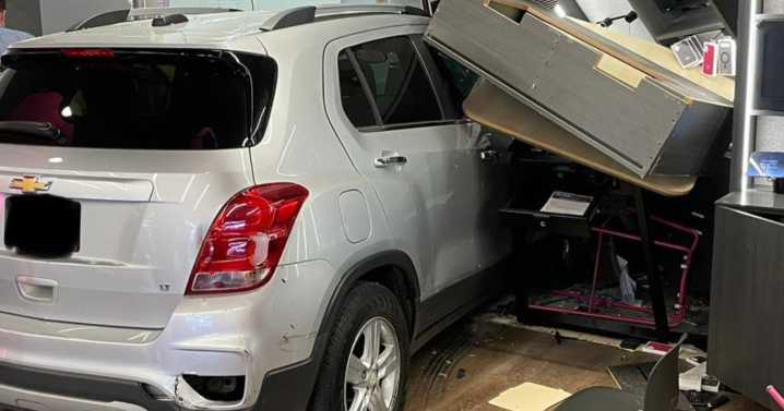 Car crashes, demolishing phone store entrance in Bartlett, police say