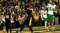 Iowa fans in shambles after stunning collapse against Oregon
