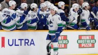 Canucks use resolve and resilience to salvage two points in OT
