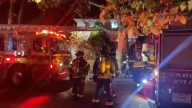 Queens house fire: 1 person killed, FDNY firefighter injured in Auburndale