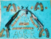 Two AK series assault rifles, One sophisticated pistol recovered from near Indo