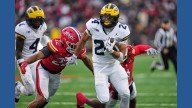Substitute RB Kuzdzal runs for 100 yards and 3 TDs to lift No. 18 Michigan over Maryland 45