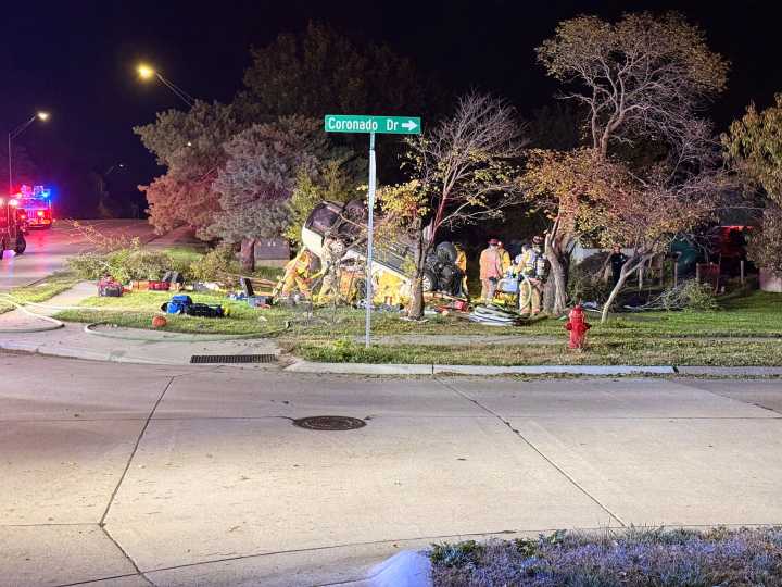 Woman pulled from vehicle following rollover crash in south Lincoln
