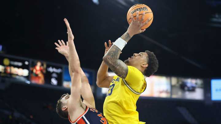 'Buzz saw' Michigan thrashes Auburn to reach Players Era title game