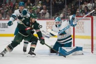 Wild dominate early, but Sharks rally for 2