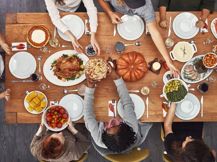 Friendsgiving 101: A history of the made-up holiday and how to celebrate it