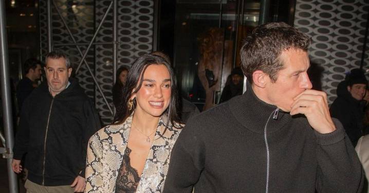 Dua Lipa Hits the Town in Lace & Snakeskin Alongside Callum Turner