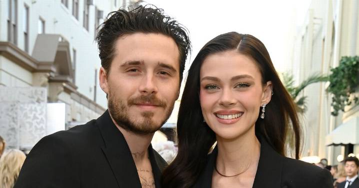 Nicola Peltz ignores Beckham feud as she drops into the splits