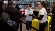 Miami Heat staffers hand out pastries, coffee to Metrorail commuters in Miami as part of World Kindness Day