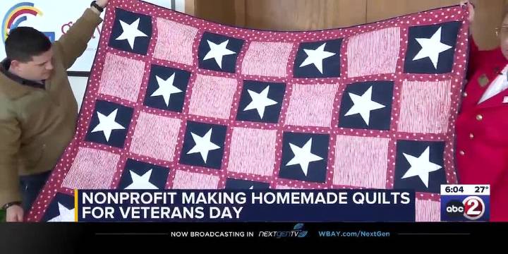 Volunteers create handmade quilts for military service members
