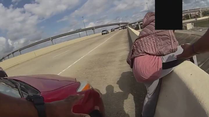 Fort Bend County deputy saves woman seconds before she jumped from Grand Parkway overpass