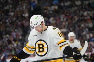 Johnny Beecher injury: Bruins forward leaves with upper