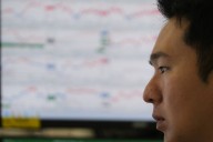 Asian shares retreat after falling tech stocks pull Wall Street lower