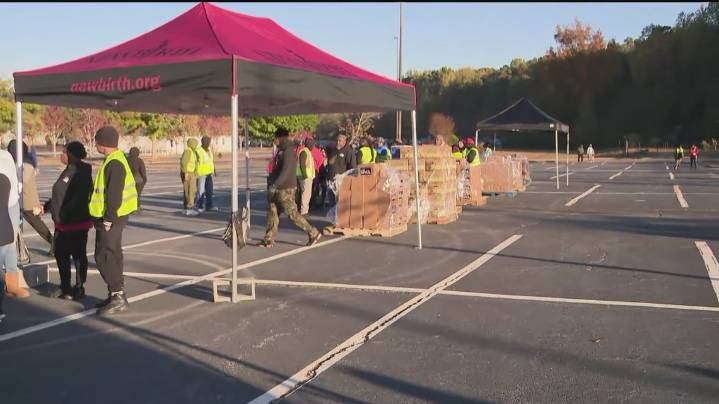 Woman sits in car for 14 hours to get food during New Birth Baptist church food giveaway