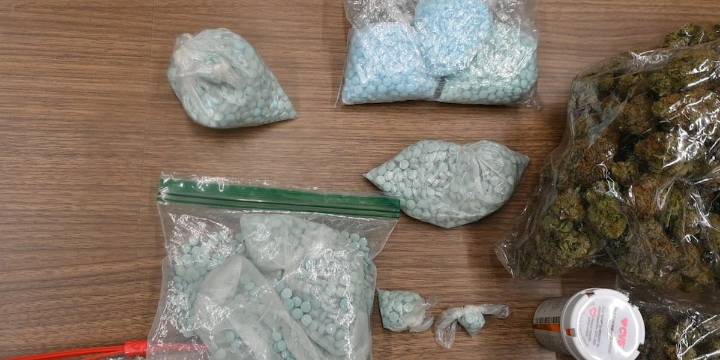 Convicted felon charged with selling opioids, US attorney says