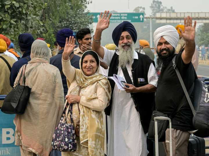 Photos: Pakistan welcomes Sikh pilgrims in first crossing since May clashes