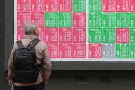 Asian shares mixed after Wall Street gets a lift from hopes for a Fed rate cut