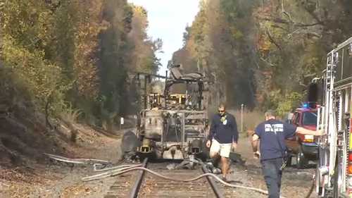 Propane tank explosion on railroad tracks causes damage to nearby buildings in Bear, Delaware