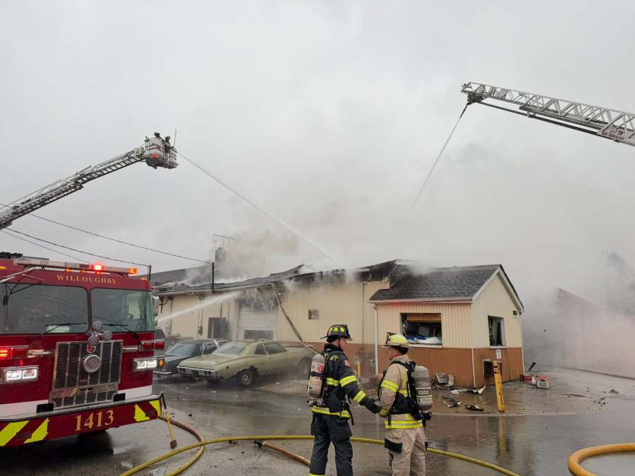 Flames shoot from burning Willoughby building