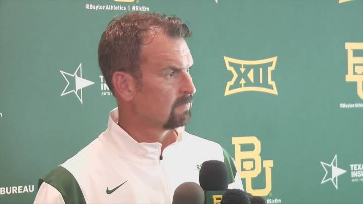 Who is Mack Rhoades and why is he under investigation by Baylor University?