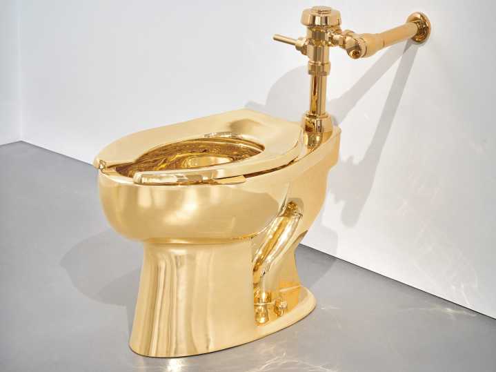 The artist behind the viral $6.2 million duct-taped banana also made a gold toilet — and it just sold for $12.1 million